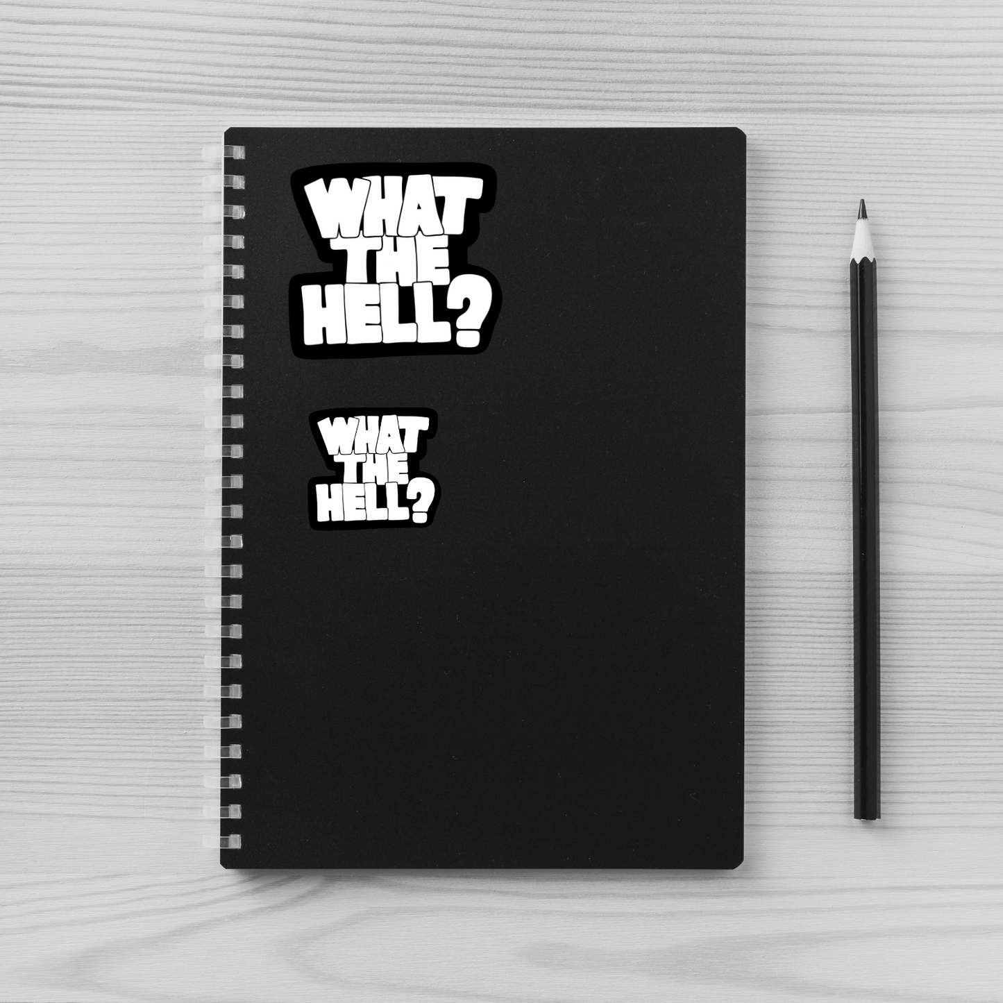 what the hell sticker, black and white graffiti sticker, funny vinyl decal, meme sticker, internet slang sticker, water-resistant sticker, sarcastic decal, relatable humor, weird sticker, chaotic energy, aesthetic sticker, sticker pack essential, moody sticker, laptop sticker, Gen Z humor, funny sticker pack, anti-establishment vibes